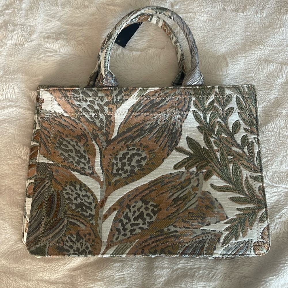 A top handle bag, great for travel or school.
